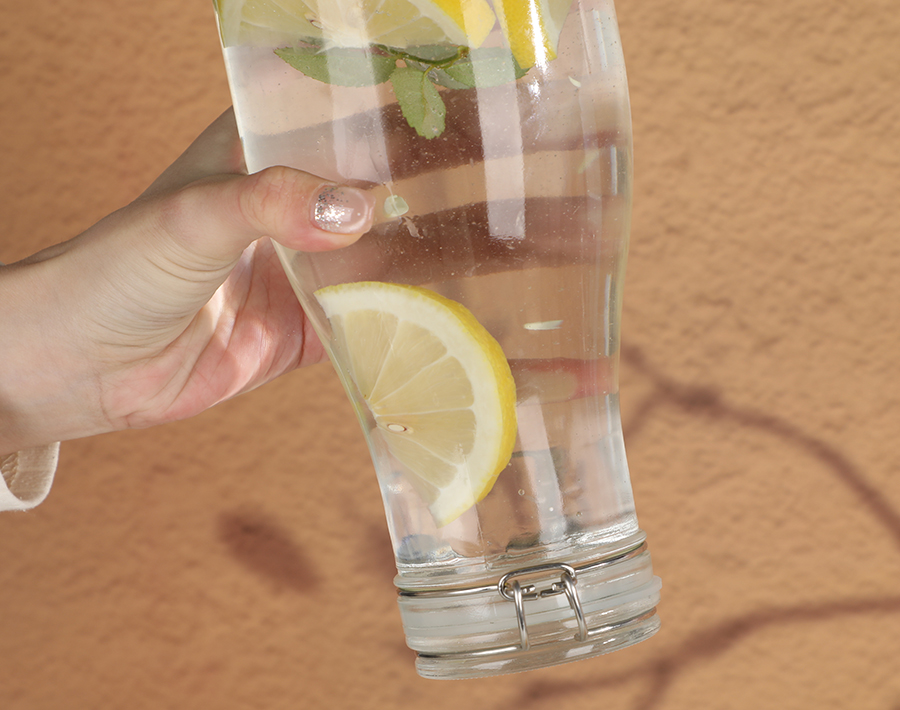 Wholesale glass water bottle with buckle lid for milk and juice
