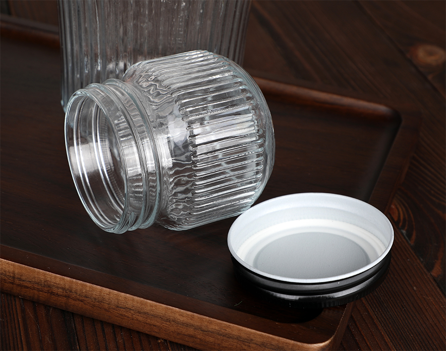 Large Glass storage jar with Stripe Design 1040ml glass storage can with black metal lid bulk 