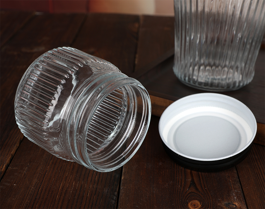 Large Glass storage jar with Stripe Design 1040ml glass storage can with black metal lid bulk 