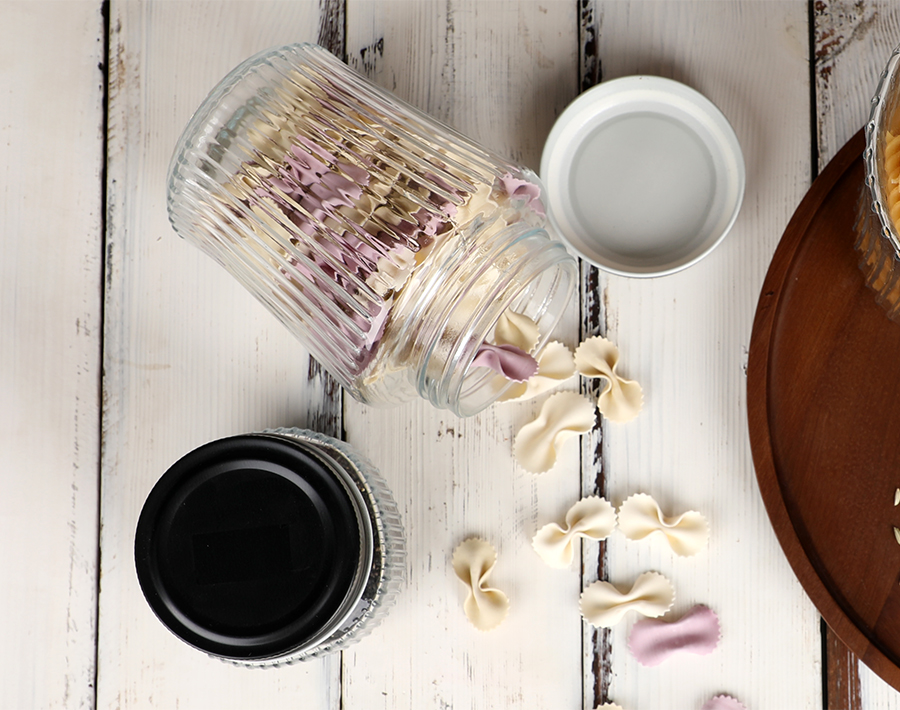 Wholesale cheap glass storage jar with vertical line design in promotion